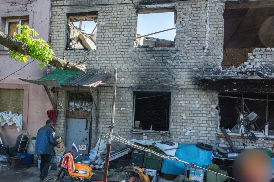 Красногорівка Донецька область окупація війна руїни люди цивільні