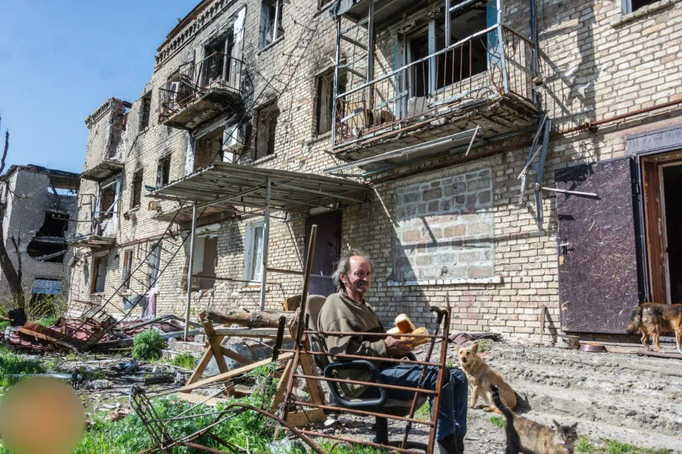 Красногорівка Донецька область окупація війна руїни люди цивільні